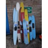 Collection of vintage water skis (outside)