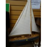 A lightwood model pond yacht with sail