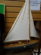 A lightwood model pond yacht with sail