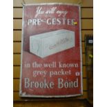An antique enamel sign for Brooke Bond Tea