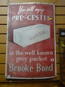 An antique enamel sign for Brooke Bond Tea