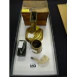 A nineteenth century brass vesta stand, a papier mache snuff box, a clay pipe etc