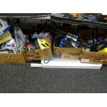 Four boxes of as new cycling accessories including saddles, helmets, lighting, bottles etc