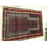 Mainly blue & red patterned old Baluchi rug, 137 x 100cms