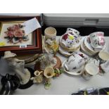 A Capodimonte wall plaque, pile of collectors plates including Royal Albert 'The Seasons' together