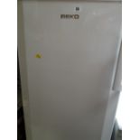 A Beko upright fridge E/T
