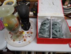 A pair of tourist ware lion dog ornaments, an onyx vase, African bust, mineral specimen dish & other