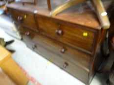 An antique mahogany chest of two long & two short drawers
