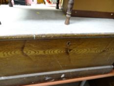 A vintage wooden sailor's chest with iron handles