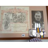 A framed honorary discharge notice for Augustus Reginald Morgan-Smith together with his silver