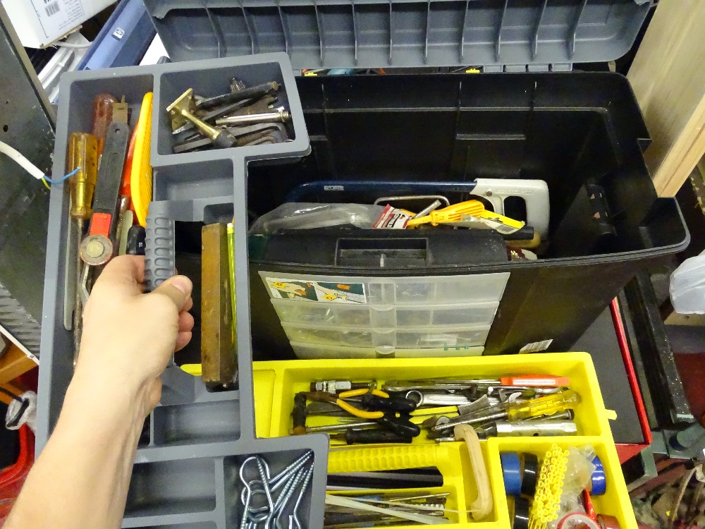Plastic toolbox with contents