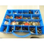 Good compartmented and lidded plastic case with large quantity of mixed dress jewellery