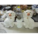 Vintage glass oil lamp and a pair of white Staffs comforter dogs