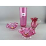 Nice parcel of three cranberry glass items - pair of fluted bon bon dishes with plain handles and