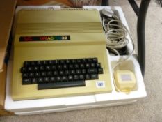 Boxed Dragon 32 retro family computer with cables and cassettes etc