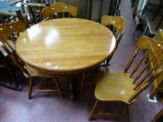 Modern circular dining table and four chairs