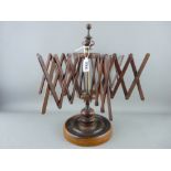 Circular based treen and brass 'Concertina' wool winder in fine order