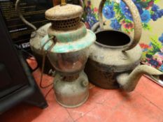 Pair of vintage iron kettles and a vintage tilly lamp