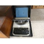 Vintage Remington Rand portable typewriter in case
