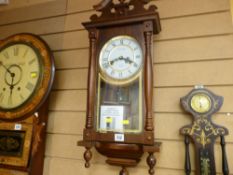 Well maintained modern thirty day pendulum wall clock and a clock and barometer combination