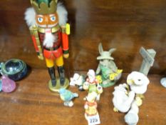 Parcel of small Goebel and other figurines and a Russian wooden comic figure