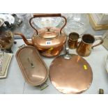 Antique copper and iron handled skillet, a Victorian copper kettle, a small fish kettle and two