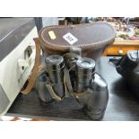 Pair of Ross, London binoculars in a leather carry case