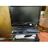 Toshiba small screen LCD TV and a Sony VHS player and Toshiba DVD player E/T