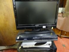Toshiba small screen LCD TV and a Sony VHS player and Toshiba DVD player E/T
