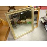 Good gilt framed bevelled wall mirror and a pine framed wall mirror of slightly smaller size
