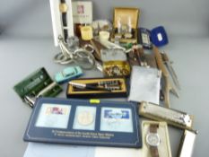 Two cardboard trays of mixed items - sundry watches, Hohner chromonica, nickel horse bits and