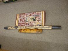 Three modern Australian Aborigine decorated items including a didgeridoo, decorative panel and a
