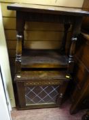 Small square two tier occasional table and a lattice lead glazed single door cupboard