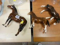 Two Beswick pottery horses (damage) and another