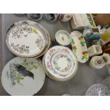 Quantity of decorative wall plates, two pottery teapot stands etc