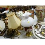 Approximately ten assorted table and ceiling lights