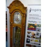 Modern Howard Miller moon dial grandfather clock, triple weight, chiming timepiece with oversized