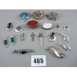 Collection of silver and other brooches and earrings including a carved cinnabar example