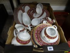 Large parcel of crimson and gilt Waterside breakfast and dinner china