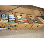 Three boxes of paperback books