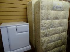 Sleep Vendor single divan bed with storage drawers and a white painted bedside cabinet