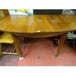 Continental inlaid edge dining table with additional leaf on tapering block supports and brass