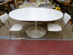Maurice Burke tulip extending dining table after a design by Eero Saarinen, the cast base marked '