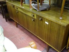 Mid Century walnut two door sideboard with central drawer and drop down flap