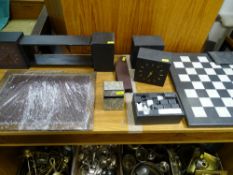 Slate and alabaster chess board and pieces, two ornamental clocks and a child's framed writing