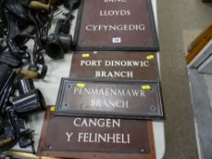 Four bronze finished Lloyds Bank doorway signs, two for Portdinorwic (one in Welsh), one for