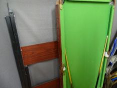 Child's Omega snooker table and stand (with cues, no balls)
