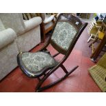 Vintage steamer type folding rocking chair