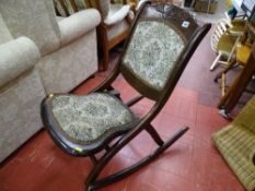 Vintage steamer type folding rocking chair