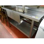 Stainless steel two tier catering table with central drawer, 123 x 66 cms